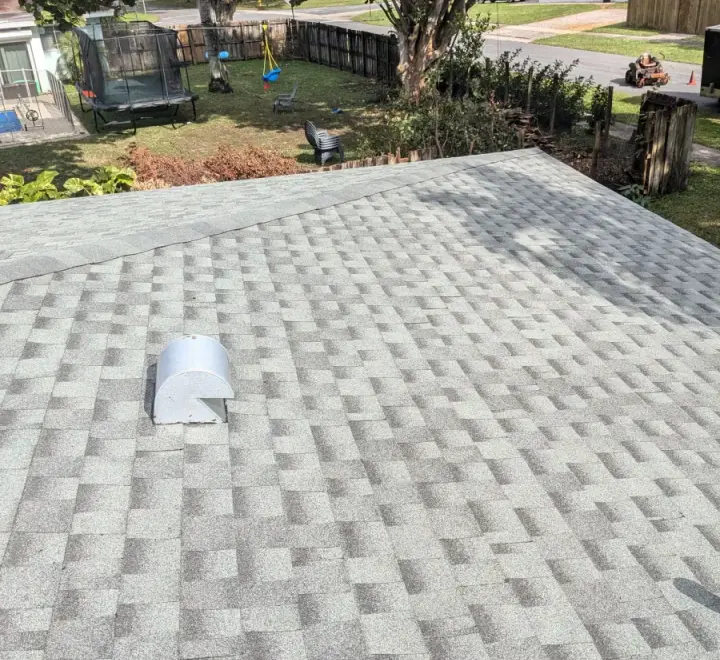 Grey architectural shingle re-roof by DR Construction & Roofing in South Florida