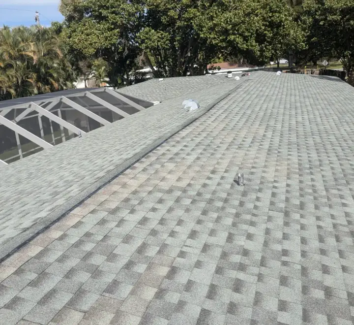 Grey architectural shingle re-roof by DR Construction & Roofing in South Florida