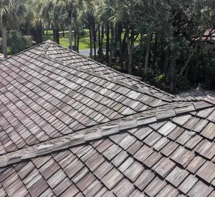 Charcoal flat tile roof installation by DR Construction & Roofing in South Florida