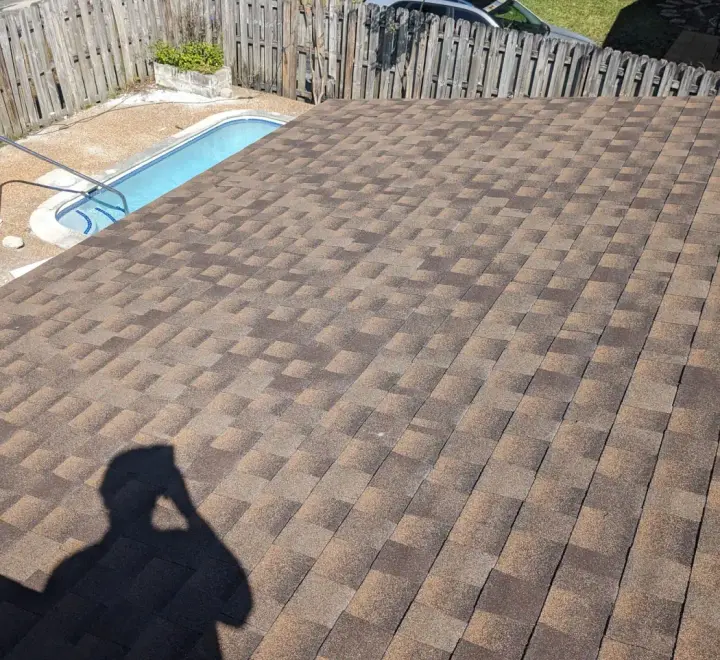 Brown architectural shingle re-roof by DR Construction & Roofing in South Florida