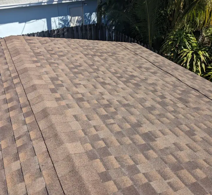 Brown architectural shingle re-roof by DR Construction & Roofing in South Florida