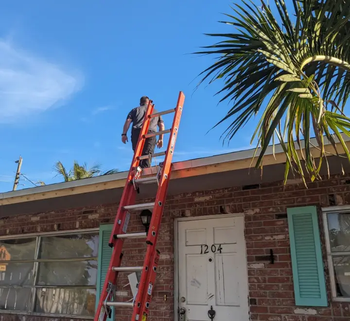 Brown architectural shingle re-roof by DR Construction & Roofing in South Florida