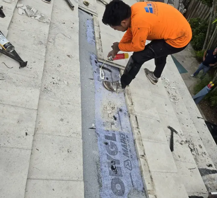 Residential tile roof repair by DR Construction & Roofing in South Florida