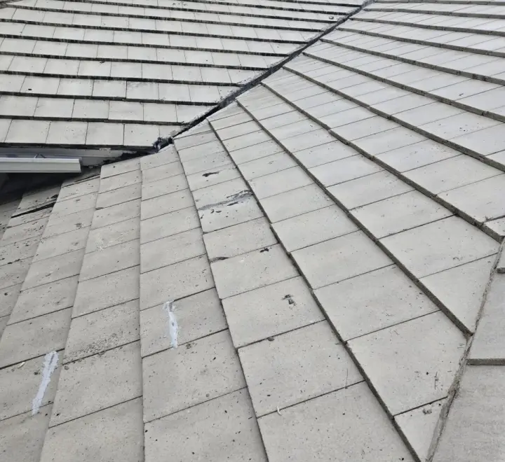 Residential tile roof repair by DR Construction & Roofing in South Florida